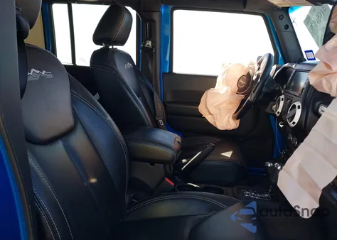 2014 Jeep Wrangler Unlimited Polar Edition z USA, uszkodzony, nr VIN 1C4HJWEG1EL188445